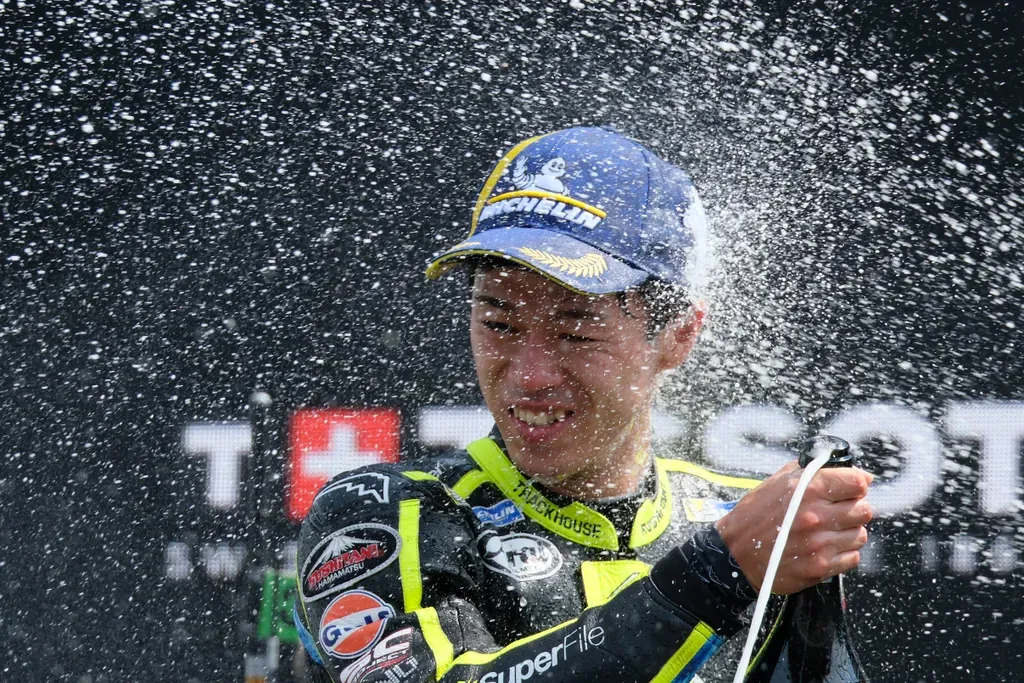Japan's rider Ai Ogura of the Trackhouse MotoGP Team celebrates after winning the MotoGP race at the Grand Prix of the Netherlands in Assen, northern Netherlands, Sunday, June 28, 2026. (AP Photo/Patrick Post)