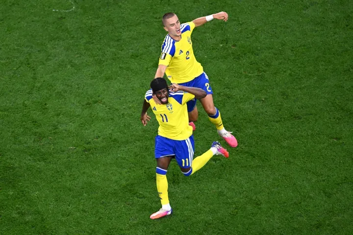 Sweden's Anthony Elanga (11) celebrates with Gustaf Lagerbielke (2) after scoring their opening goal during the World Cup Group F soccer match between Japan and Sweden in Arlington, Texas, near Dallas, Thursday, June 25, 2026. (AP Photo/Jessica Tobias)