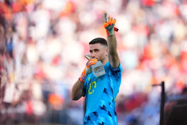 Spain goalkeeper Unai Simon (23) celebrates with the Golden Glove trophy after the World Cup final soccer match between Spain and Argentina in East Rutherford, N.J., near New York, Sunday, July 19, 2026. (AP Photo/Abbie Parr)