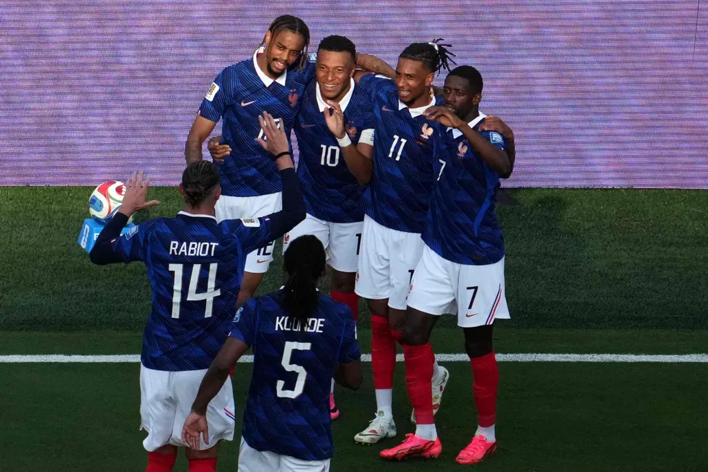 TOPSHOT - France's forward #10 Kylian Mbappe celebrates scoring his team's third goal with teammates during the 2026 World Cup round of 32 football match between France and Sweden at the New York/New Jersey Stadium in East Rutherford on June 30, 2026. (Photo by TIMOTHY A. CLARY / AFP)