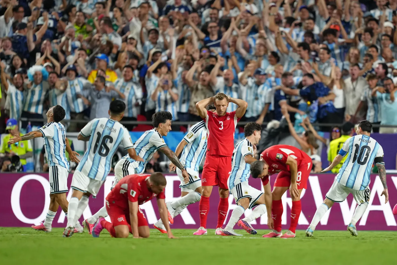Switzerland's Silvan Widmer (3) reacts after Argentina's second goal from Julian Alvarez during the World Cup quarterfinal soccer match between Argentina and Switzerland in Kansas City, Mo., Saturday, July 11, 2026. (AP Photo/Ed Zurga)